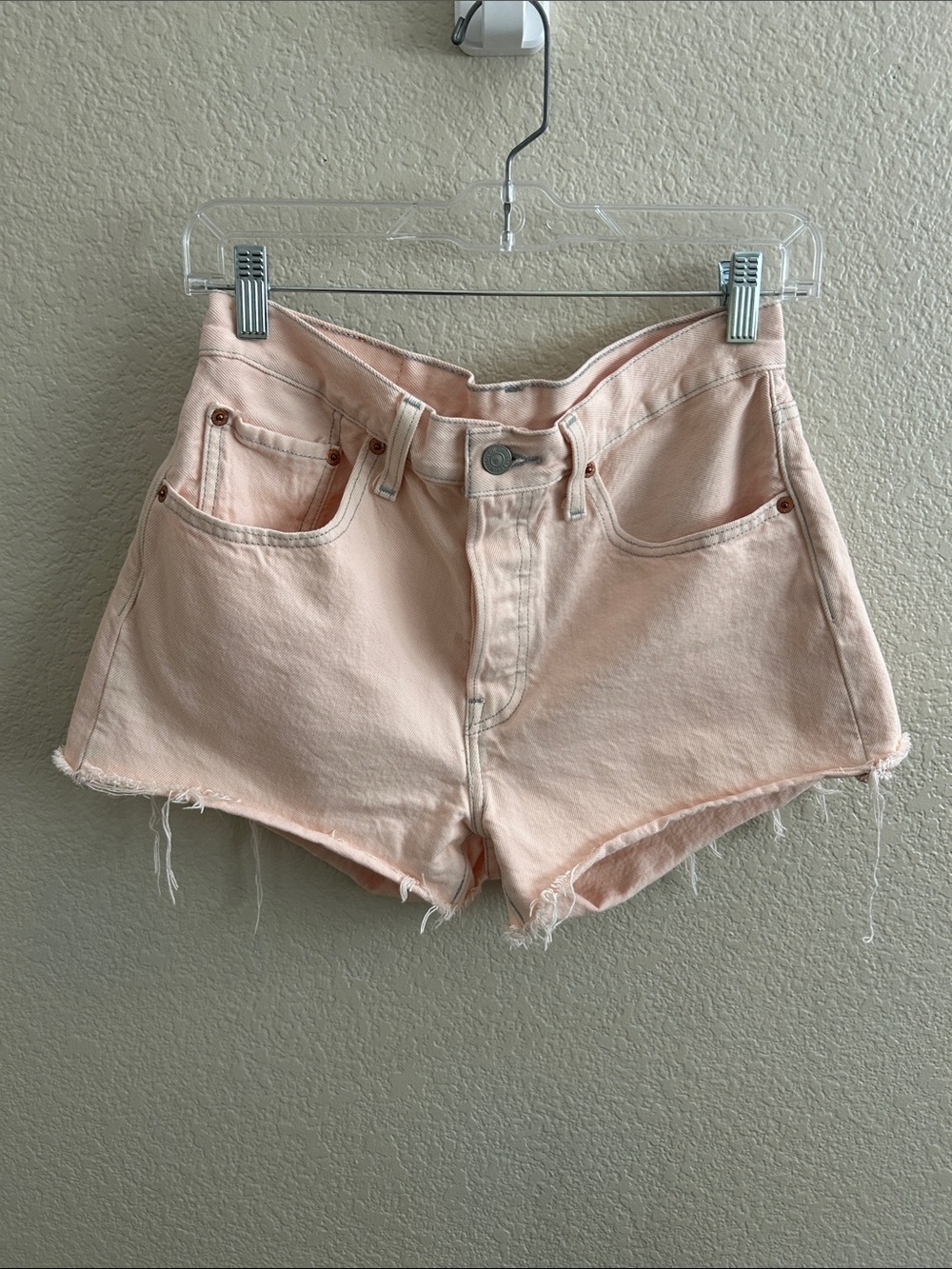 Levi’s 501 High Rise Denim Cut-off Shorts in Light Pink/Peach